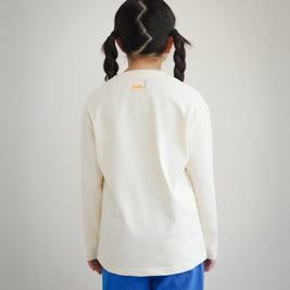 Back view of kids ivory cotton long sleeve t-shirt with Brrr main label on the outside back neck
